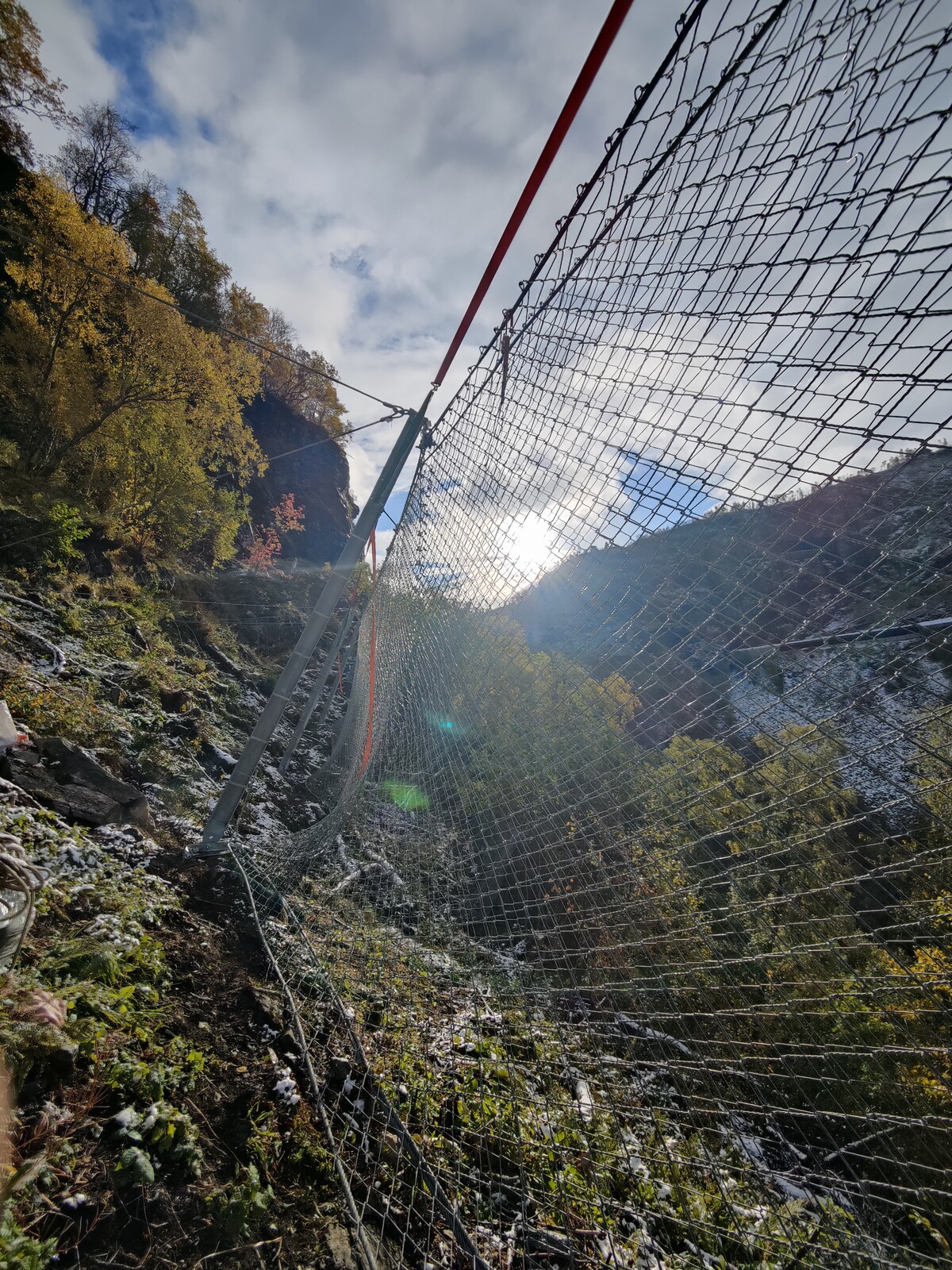 A finished section of the rockfall barrier with the net mounted
